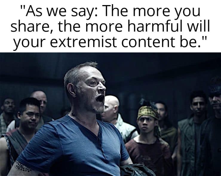 The meme features a screenshot from the movie "V for Vendetta" where a character, V, is addressing a crowd of people. The image shows V standing in front of a crowd, shouting and pointing a finger at them. The text overlayed on the image reads: "As we have said, the more you share, the more you help the enemy. The more you share, the more you harm yourself. The more you share, the more you destroy yourself. The more you share, the more you help the enemy. The more you share, the more you harm yourself. The more you share, the more you destroy yourself. The more you share, the more you help the enemy. The more you share, the more you harm yourself. The more you share, the more you destroy yourself."